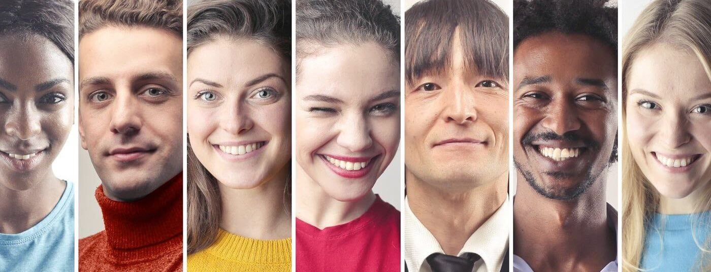 3 woman from different ethnicities smiling at the camera 