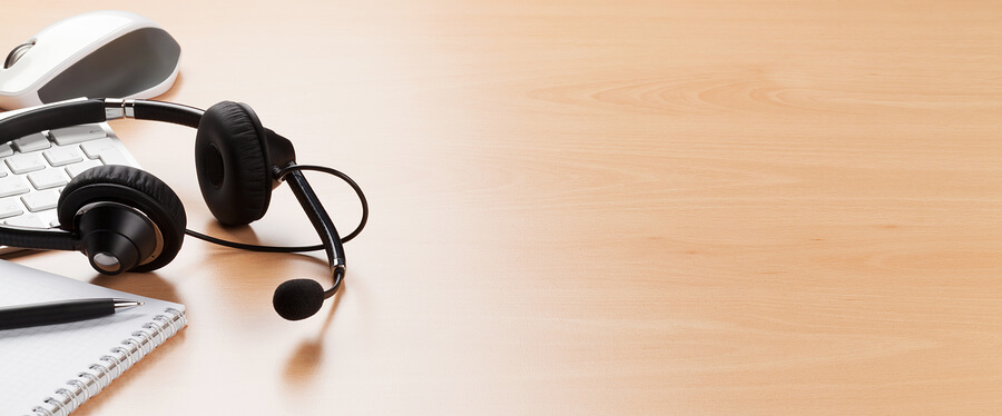 headset on a wooden desk 
