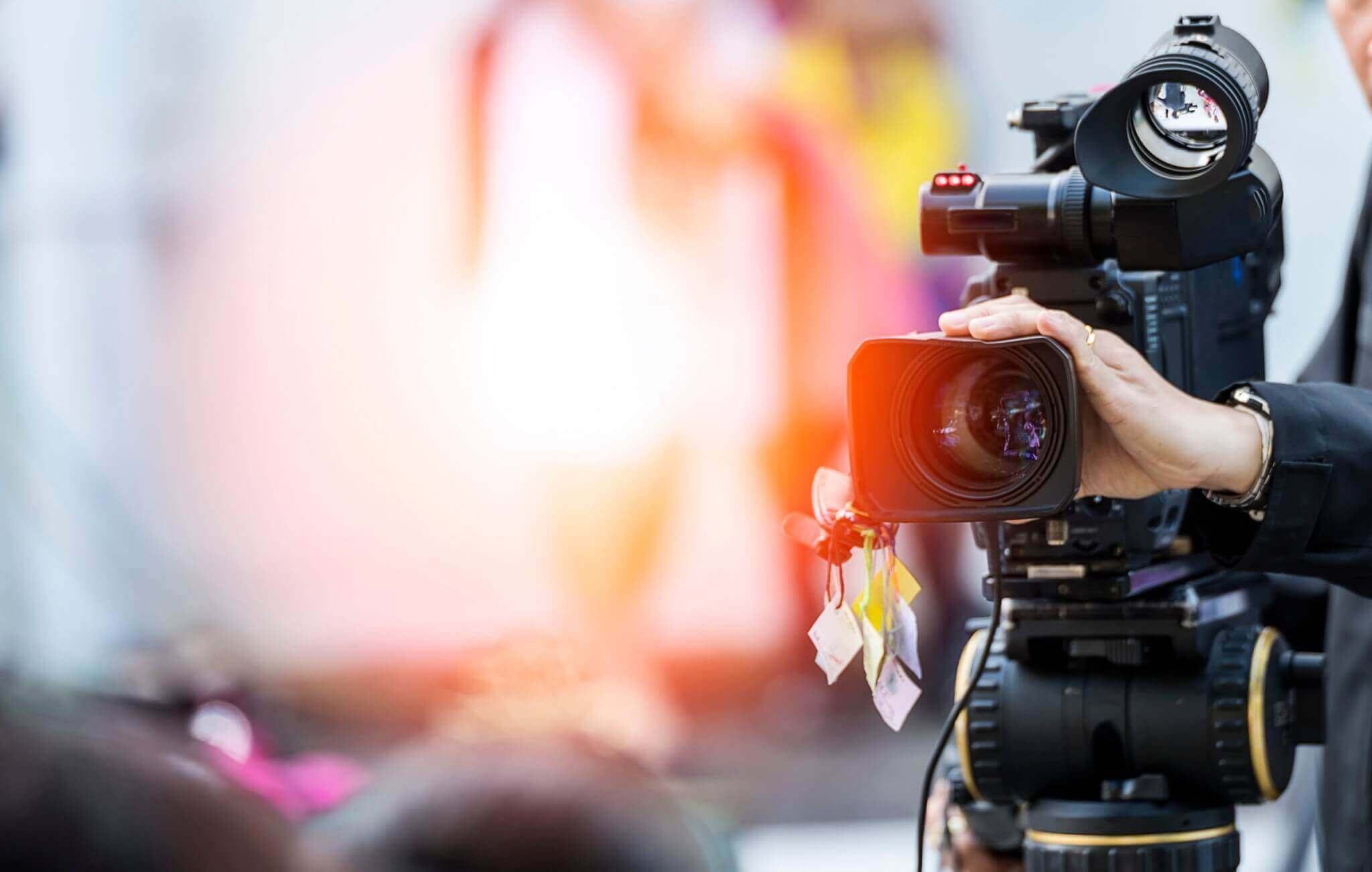 Video camera operator working with his equipment