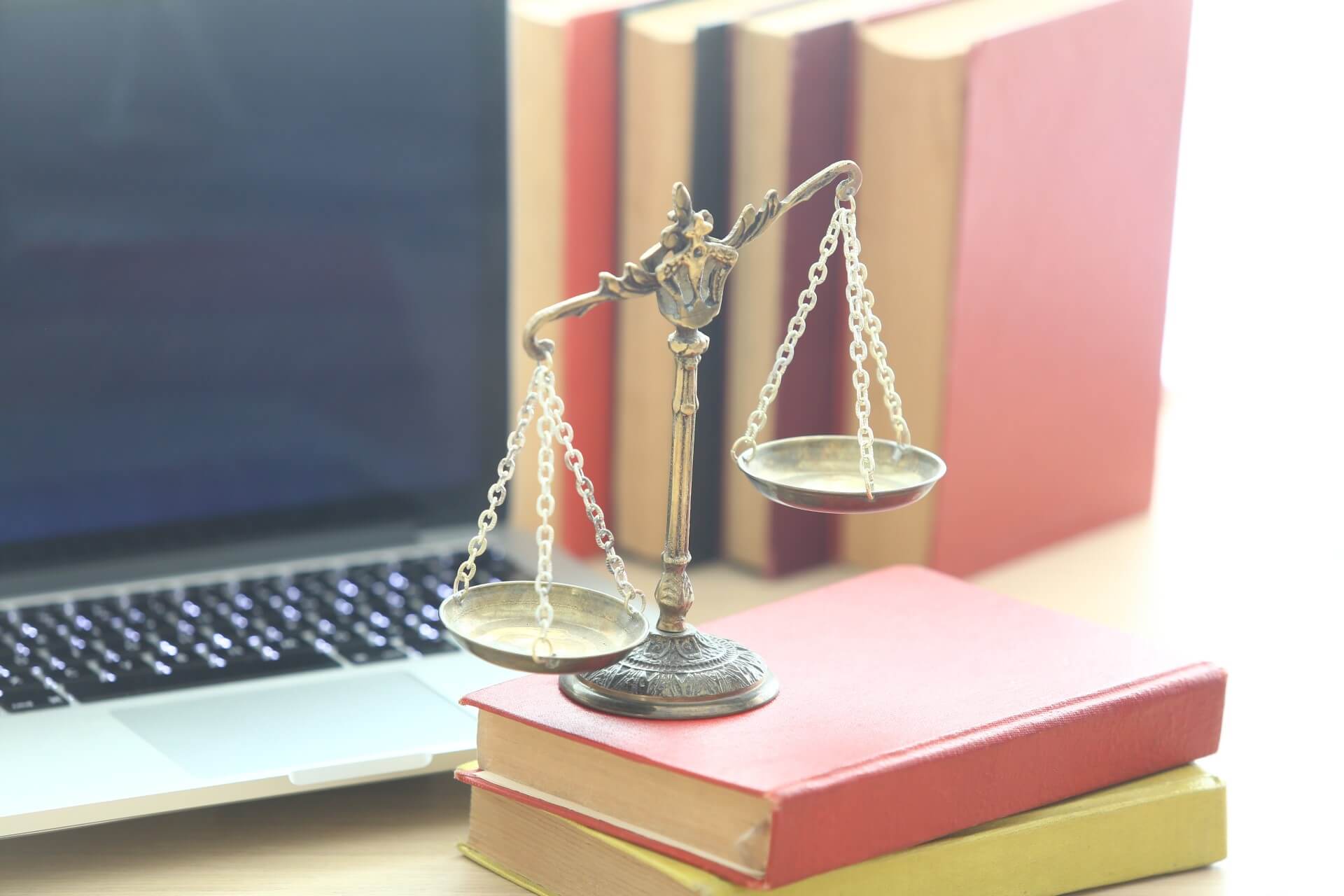 scales of justice on legal books 