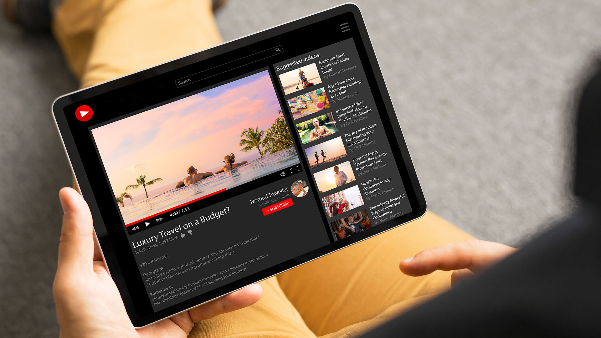 person watching YouTube on there ipad 