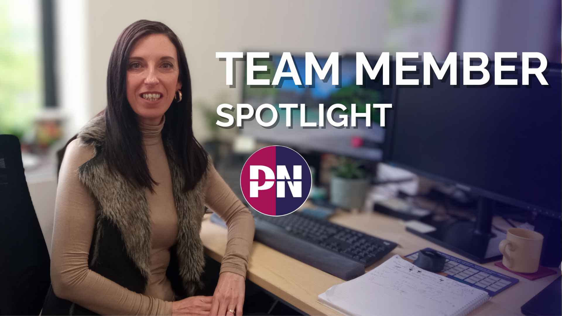 Image of Jane (Featured Team member) in office with PN Logo