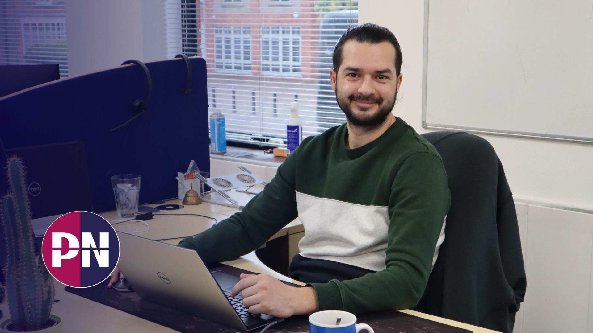 Vadim at PN with his desk in order